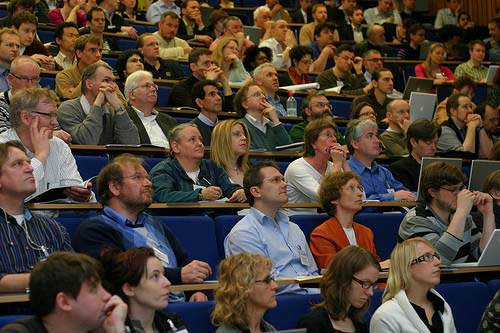 photo (36KB) : Figure 1 : Some of the delegates at OR08 in the main conference room.